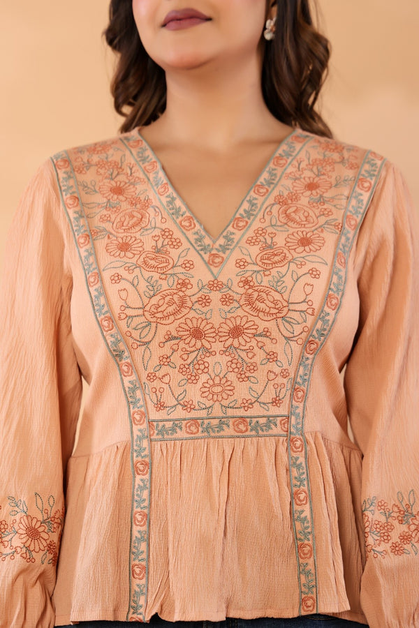 Women Peach Floral Embroidered Cotton Peplum Top